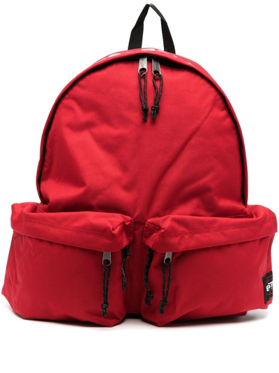 Shop Undercover X Eastpak Slogan-print Backpack In Red