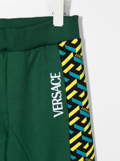 Shop Versace Geometric-pattern Print Track Pants In Green