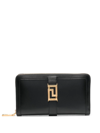 Shop Versace Greca-buckle Zip Wallet In Black