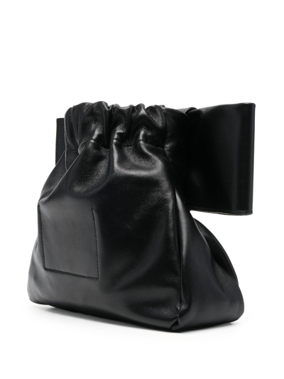 Shop Jil Sander Bow-detail Leather Crossbody Bag In Black