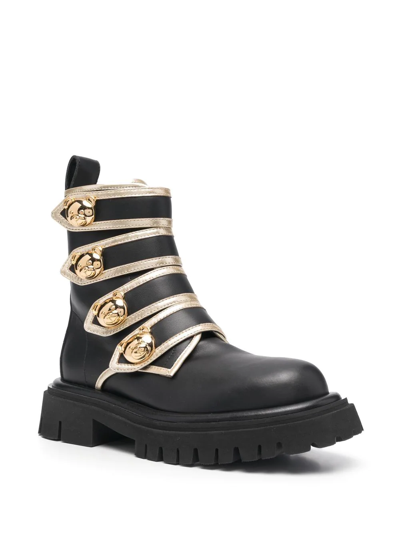 Moschino Side-buckle Ankle Boots In Black
