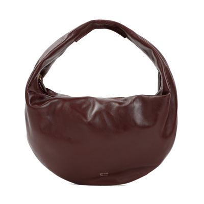 Shop Khaite Olivia Zipped Medium Shoulder Bag In Red