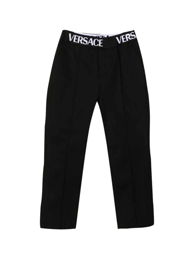 Shop Versace Black Trousers Unisex Kids In Nero