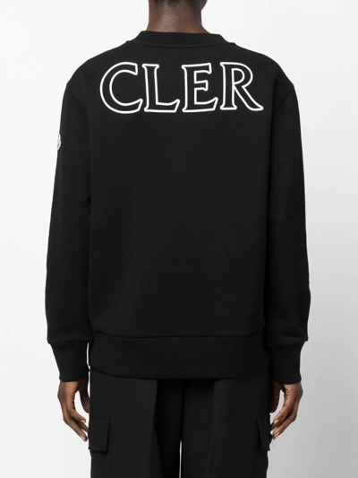 Shop Moncler Logo-print Long-sleeved Sweater In Black