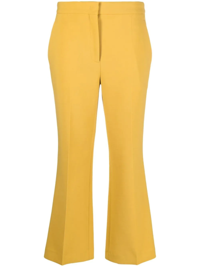 Shop Rochas Cropped Flared Trousers In Gelb