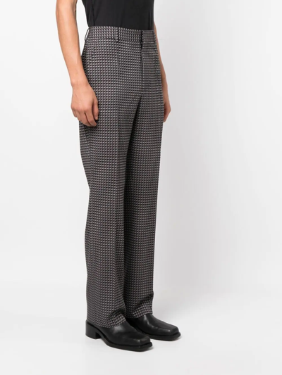 Shop Valentino Ministud Pattern Tailored Trousers In Grey