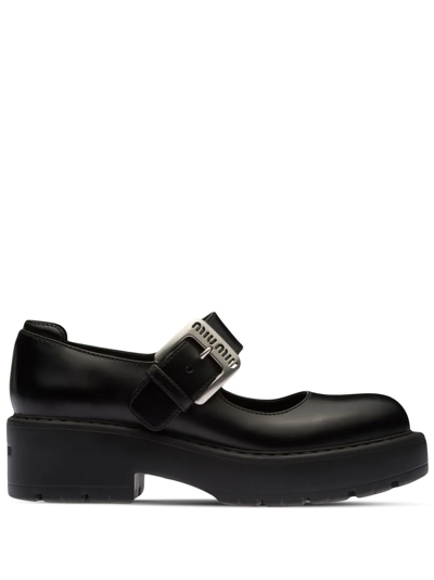 Shop Miu Miu Chunky Buckle-fastening Loafers In Black