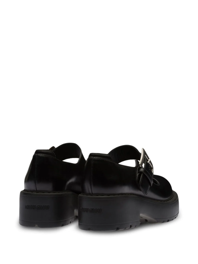 Shop Miu Miu Chunky Buckle-fastening Loafers In Black