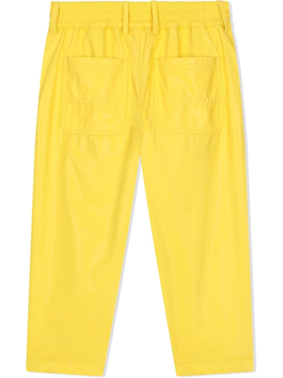 Dolce & Gabbana Coated-nylon Worker Trousers In Yellow