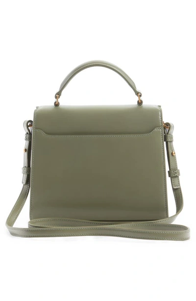 Shop Saint Laurent Mini Cassandra Leather Top Handle Bag In Light Sage