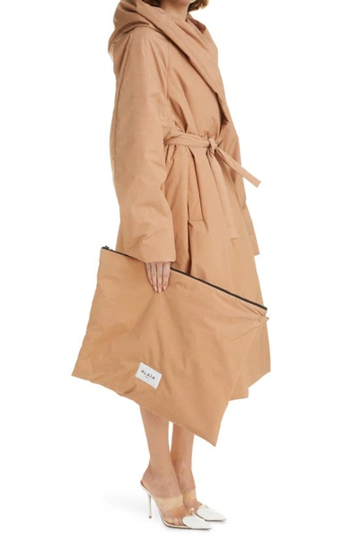 Shop Alaïa Hooded Wrap Coat In Nude