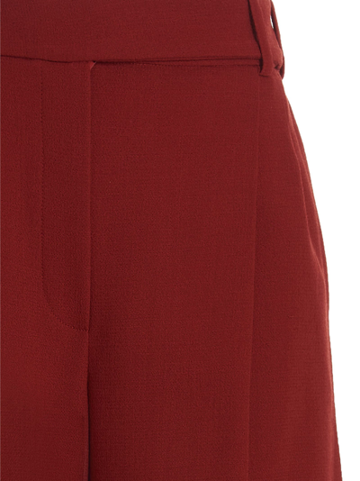 Shop Alexandre Vauthier Pin Tuck Wide Trousers In Red