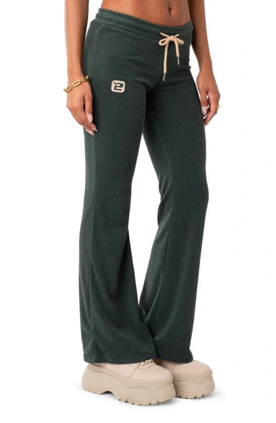 Edikted Terry Low Rise Flare Leg Pants In Green