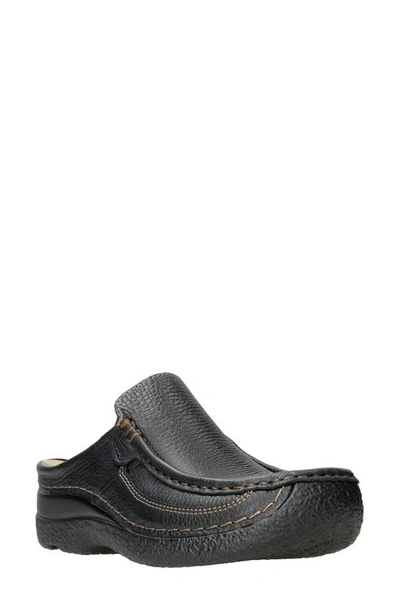 Shop Wolky Roll Slide Mule In Black Printed Leather