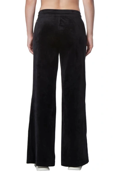 Shop Andrew Marc Sport Long Vented Pants In Black