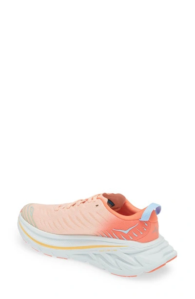 Shop Hoka Bondi X Running Shoe In Camellia / Peach Parfait