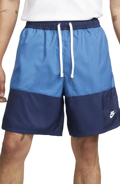 Shop Nike Essentials Colorblock Flow Shorts In Navy/ Dark Marina Blue