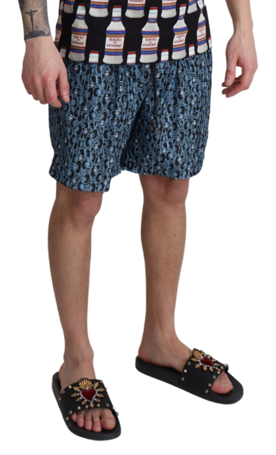 Shop Dolce & Gabbana Blue Patterned Print Beachwear Shorts Men's Swimwear