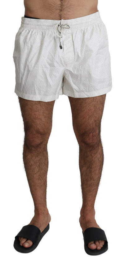 Shop Dolce & Gabbana Chic Polka Dot Swim Shorts Men's Trunks In White