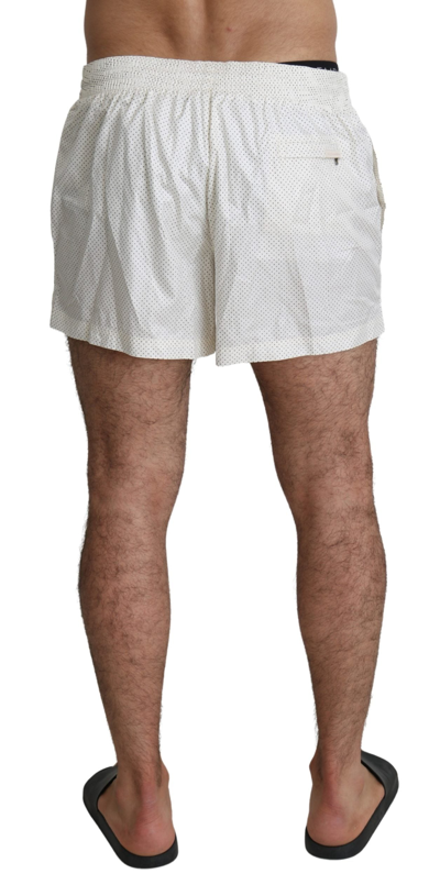Shop Dolce & Gabbana Chic Polka Dot Swim Shorts Men's Trunks In White