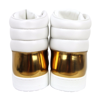 Shop Gucci Men's High Top Contrast Padded Leather Sneaker In White / Gold