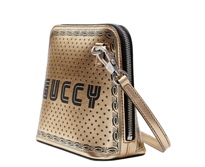 Shop Gucci Women's Gold Guccy Sega Script Dome Mini Crossbody Bag