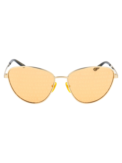 Shop Gucci Women's Gold Metal Sunglasses