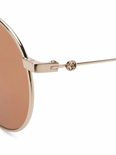 Shop Gucci Women's Gold Metal Sunglasses