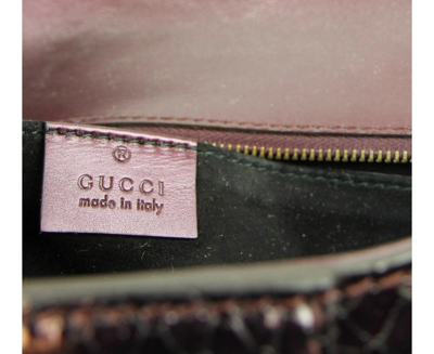 Gucci Women's Python Soft Stirrup Clutch Bag 304719 In Plum