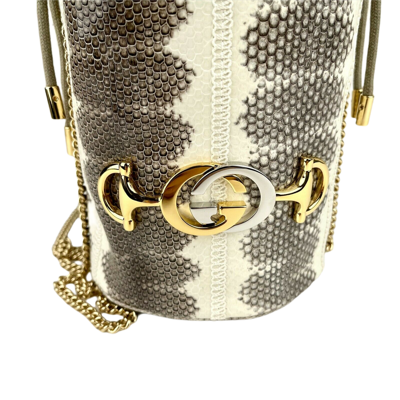 Shop Gucci Zumi White/gray Snakeskin Mini Drawstring Bucket Chain Bag In White , Grey