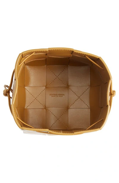 Shop Bottega Veneta Mini Cassette Drawstring Bucket Bag In Camel 20-gold