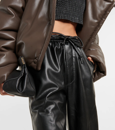Shop Nanushka Calie Straight Faux Leather Pants In Black