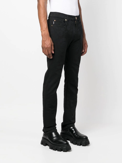 Shop Versace Barocco Jacquard Slim-fit Jeans In Schwarz