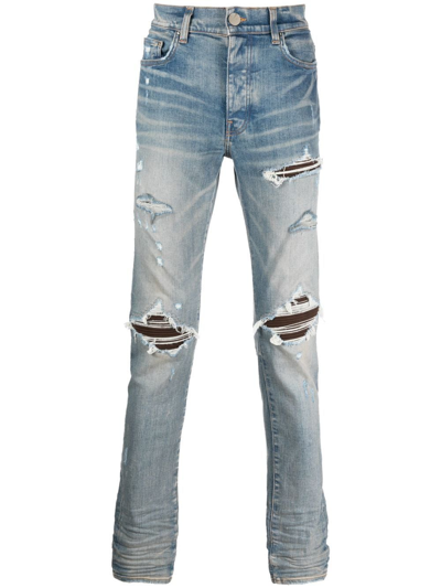 Shop Amiri Distressed Slim-cut Jeans In Blau