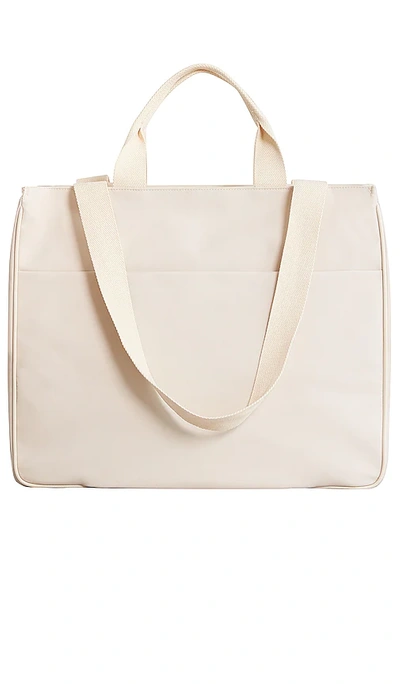 Shop Beis The East / West Tote In Beige