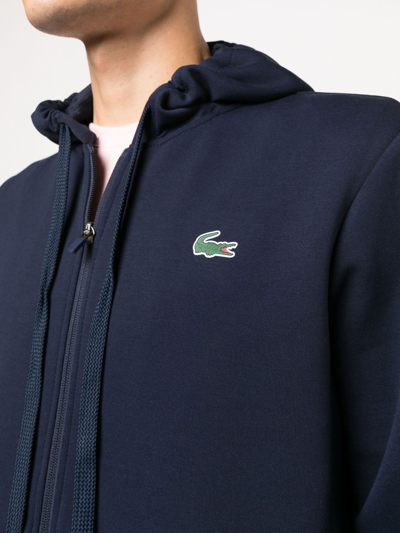 Shop Lacoste Logo-patch Zipped Hoodie In Blau