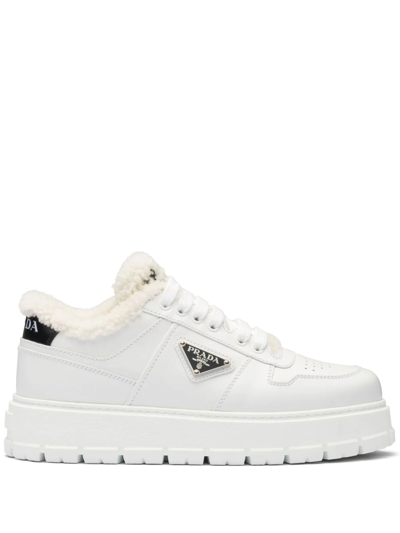 Shop Prada Triangle-plaque Low-top Sneakers In White