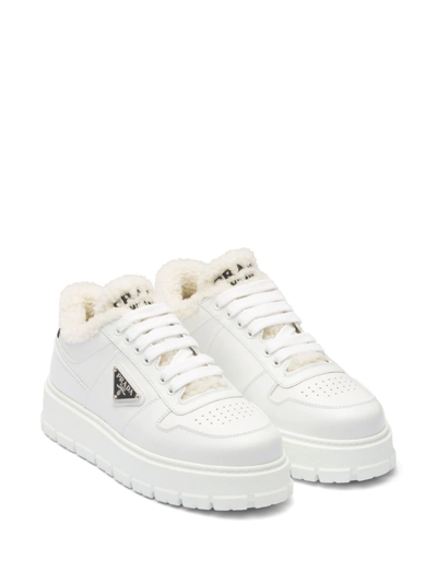 Shop Prada Triangle-plaque Low-top Sneakers In White