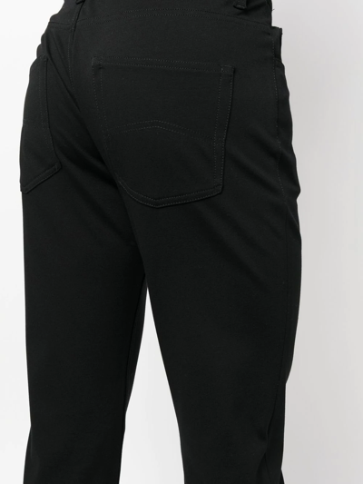 Shop Emporio Armani Slim-fit Trousers In Schwarz