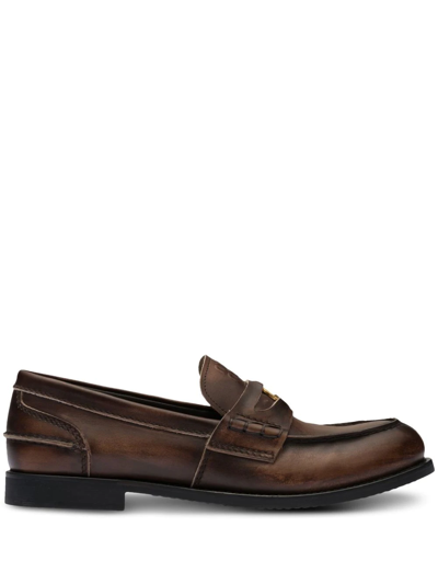 Shop Miu Miu Logo-embossed Leather Penny Loafers In Braun