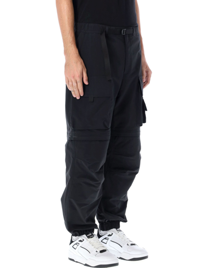 Shop Msgm Cargo Pants In Black