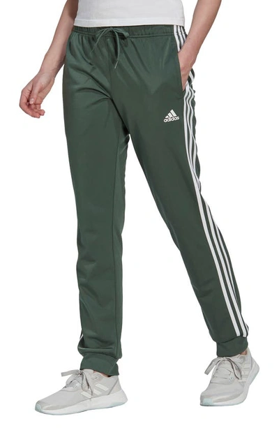 Adidas Originals Adidas Women's Essentials Warm-up Slim Tapered 3-stripes  Track Pants, Xs-4x In Green Oxide/ White | ModeSens