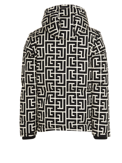 Shop Balmain Maxi Monogram Hooded Down Jacket In White/black