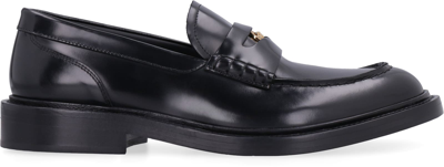 Shop Versace Leather Loafers In Black