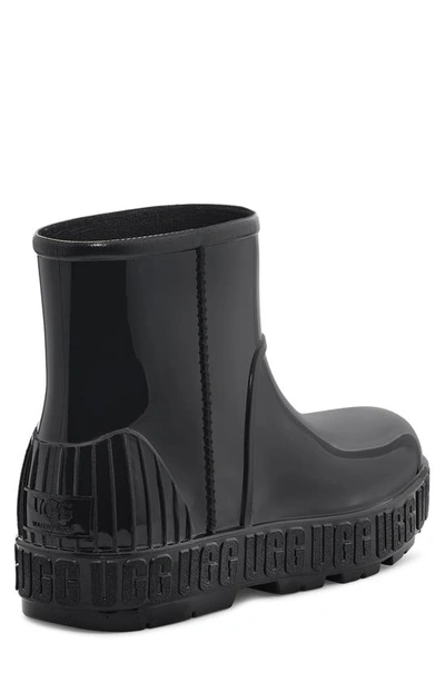 Shop Ugg Drizlita Genuine Shearling Lined Rain Boot In Black