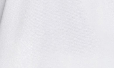 Shop Nike Dri-fit Rafa Slim Fit Polo In White/ Black