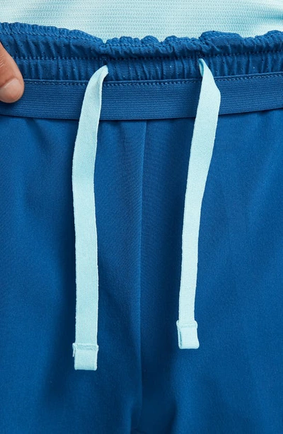 Shop Nike Dri-fit Adv Rafa Tennis Shorts In Court Blue/ Copa/ White