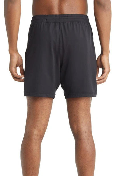 Shop Alo Yoga Conquer Workout Shorts In Black