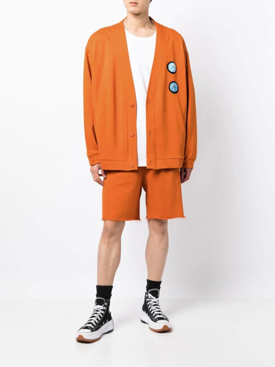 Shop Off Duty Flak Smiley Patch Cardigan In Orange