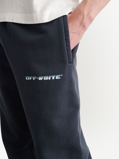 Shop Off-white Arrows-print Track Pants In Blau